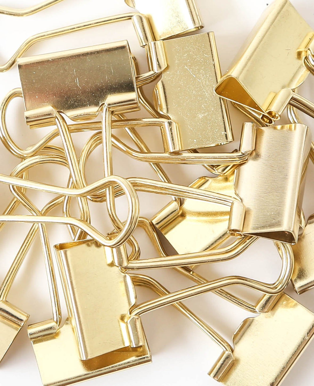 Paper clips, gold